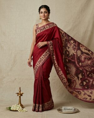 deep maroon tussar silk saree with hand painted kalamkari pallu and floral borders