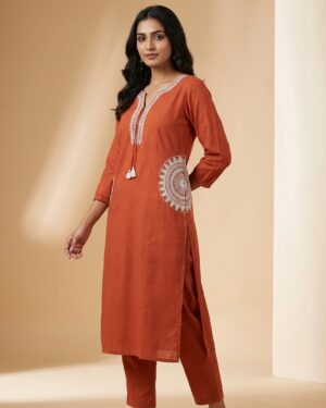 elegant terracotta kurta with intricate embroidered pocket