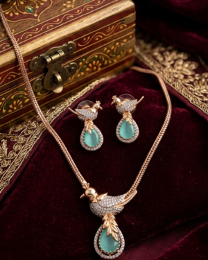 This Elegant Pendant Set with Intricate Bird Motif is designed to suit multiple occasions. Pair it with sarees, kurtis, gowns, or even casual outfits for a chic look. Whether it’s a festive celebration, a formal event, or a casual outing, this set adapts effortlessly to your style.