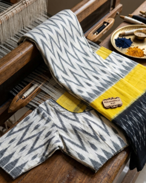 mercerized pochampally ikat pure cotton saree in sunshine yellow, black & white zigzag weave