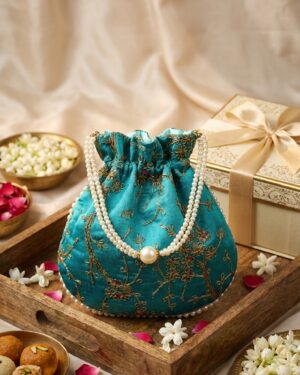 exquisite turquoise embroidered potli bag with pearl bead handle