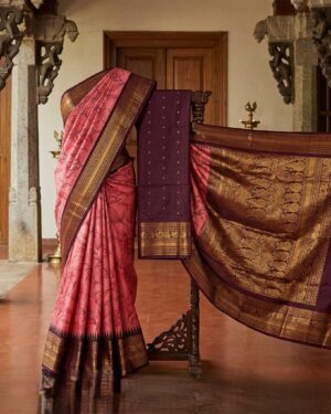 Elegant Peach-Pink Gadwal Silk Saree with Contrast Wine-Purple Zari Border and Floral Motifs