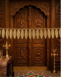 Trendy Cottage brass mango leaf thoranam, 58 inch, hanging across a main door