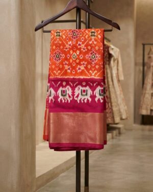 Exquisite Pochampalli Orange Lehanga with Handwoven Ikat Motifs
